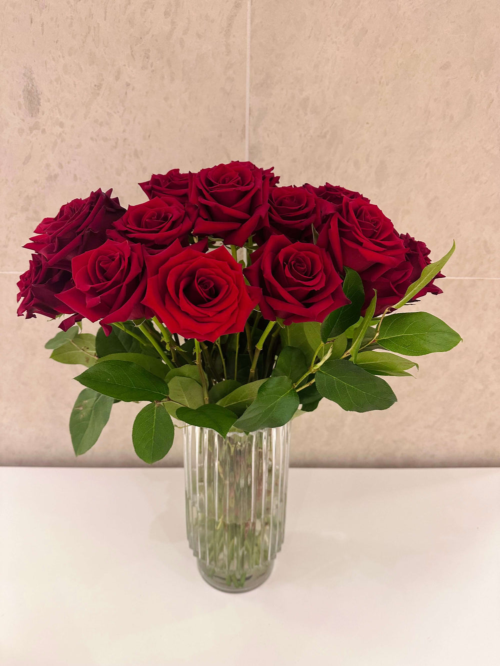 DOZEN ROSES IN A VASE