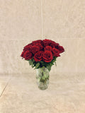 TWO DOZEN ROSES IN A VASE